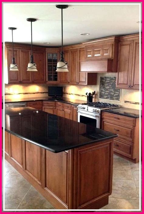 dark oak kitchen cabinets with stainless steel countertop|countertops that match oak cabinets.